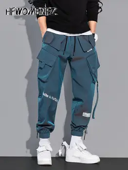 Лазерные Модные карманы Длинные брюки для мужчин 2023 Весна Лето Леггинсы-карго с эластичной резинкой на талии Мужские брюки в стиле хип-хоп Хай-Стрит Шик